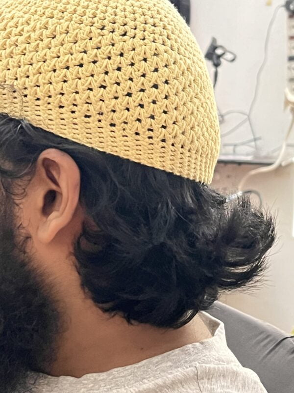 Muslim Men wearing light yellow color cap